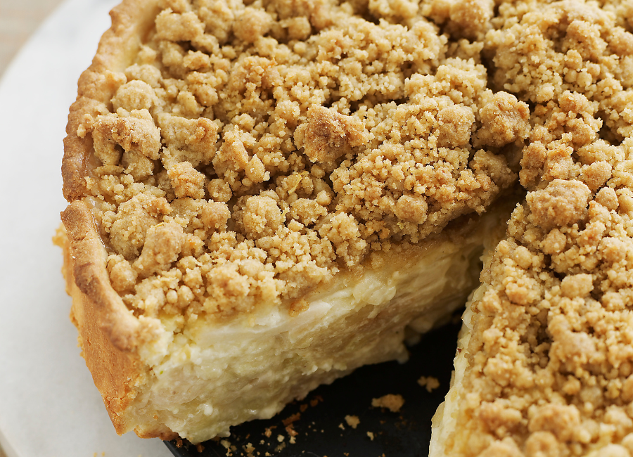 Amish Vanilla Pie with a slice cut out of it.