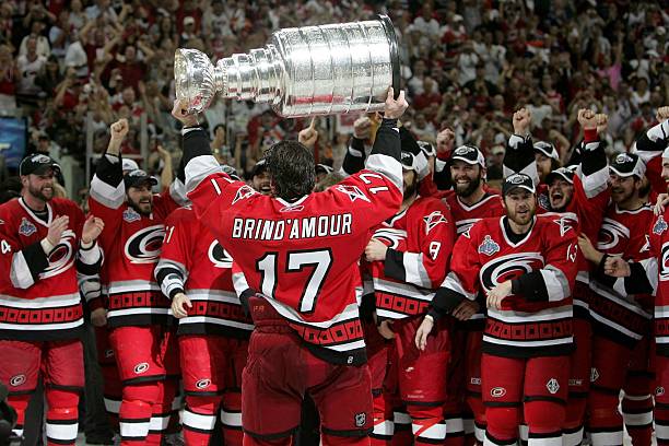 Rod Brind'Amour of the Carolina Hurricanes lifts the Stanley Cup after defeating the Edmonton Oilers in game seven of the 2006 NHL Stanley Cup Finals...