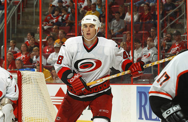 Defenseman Nikos Tselios of the Carolina Hurricanes skates on the ice during the pre-season NHL game against the Philadelphia Flyers at the RBC...