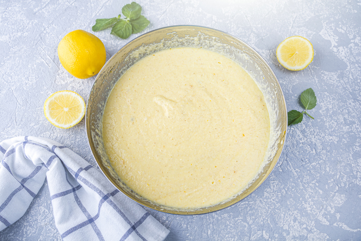 Lemon batter in a clear bowl.