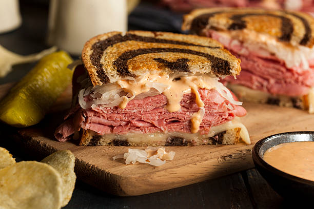 homemade reuben sandwich - pastrami sandwich on rye stock pictures, royalty-free photos & images