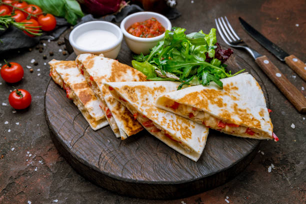 quesadilla with chicken and sauces - quesadilla stock pictures, royalty-free photos & images