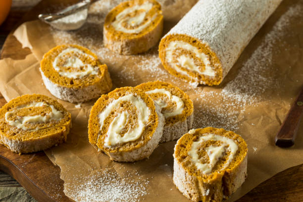 homemade sweet pumpkin roll - pumpkin roll stock pictures, royalty-free photos & images