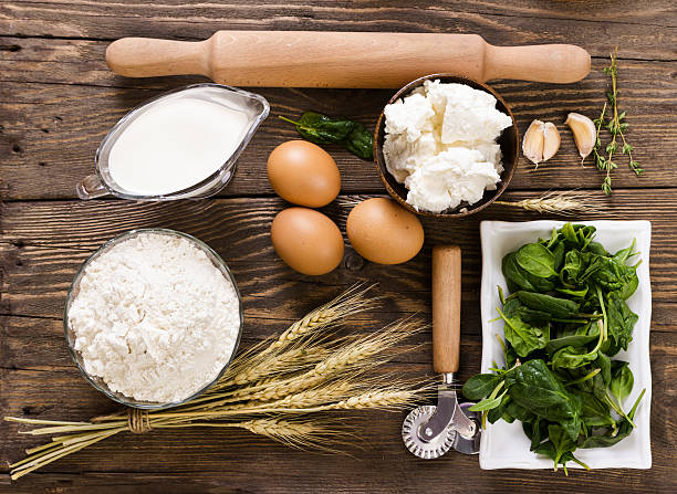 ingredients for ravioli with spinach and ricotta cheese - ricotta and spinach stock pictures, royalty-free photos & images