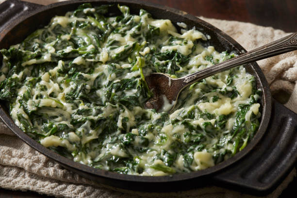 fresh creamed spinach - creamy spinach side stock pictures, royalty-free photos & images