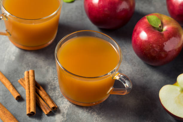 healthy organic mulled apple cider - apple cider warm stock pictures, royalty-free photos & images