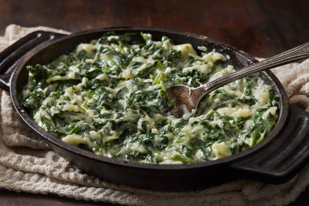 fresh creamed spinach - creamed spinach side stock pictures, royalty-free photos & images