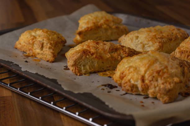 cheese scones viewed from the side - cheddar biscuits stock pictures, royalty-free photos & images