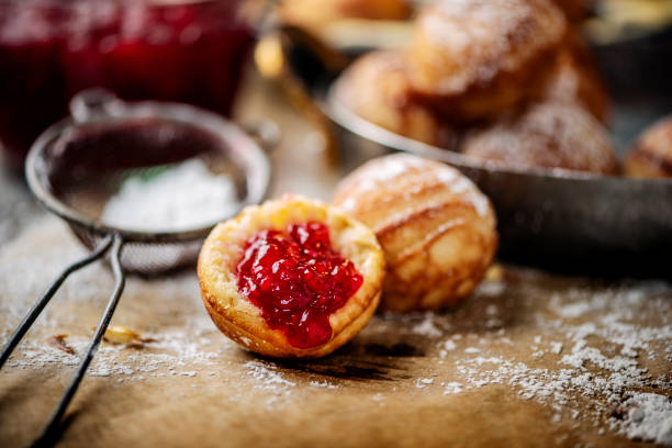 aebleskiver - cranberry brie bites stock pictures, royalty-free photos & images