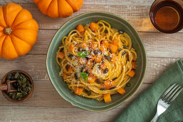 spaghett ipasta with pumpkin - butternut squash pasta stock pictures, royalty-free photos & images