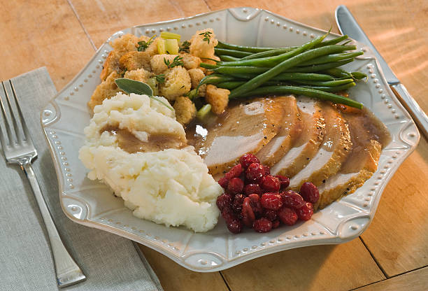 thanksgiving dinner on plate - thanksgiving mashed potatoes stock pictures, royalty-free photos & images