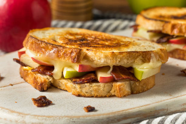 homemade bacon apple grilled cheese panini - grilled cheese with apple and bacon stock pictures, royalty-free photos & images