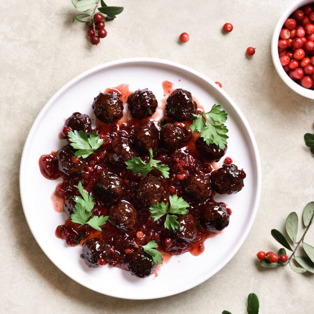 meatballs with cranberry sauce - cranberry glazed turkey meatballs stock pictures, royalty-free photos & images