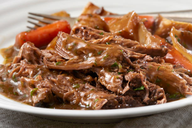 pot roast dinner - pot roast dinner slow cooker stock pictures, royalty-free photos & images