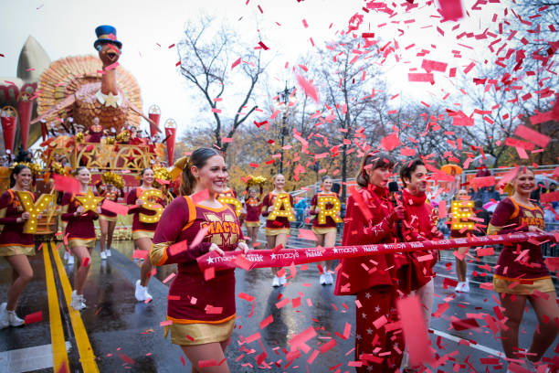 Reveller reacts as the Annual Thanksgiving Day Parade kicks off on November 28, 2024 in New York City.