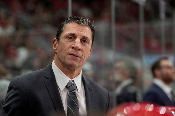 Head coach Rod Brind'Amour of the Carolina Hurricanes looks on during the first period of the game against the Colorado Avalanche at Lenovo Center on...