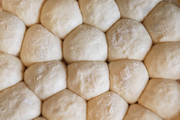 dough balls - they are risen! - pull apart bread dough stock pictures, royalty-free photos & images