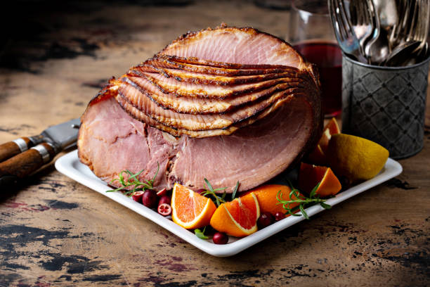 christmas ham brown sugar glazed - honey baked ham on plate stock pictures, royalty-free photos & images