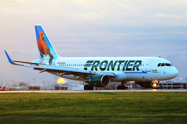 frontier airlines a320 at cleveland hopkins international airport - frontier airlines stock pictures, royalty-free photos & images