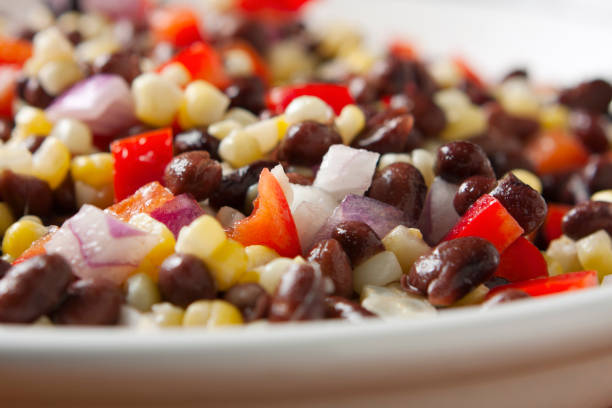 southwestern black beans and corn salad - corn and bean salsa stock pictures, royalty-free photos & images