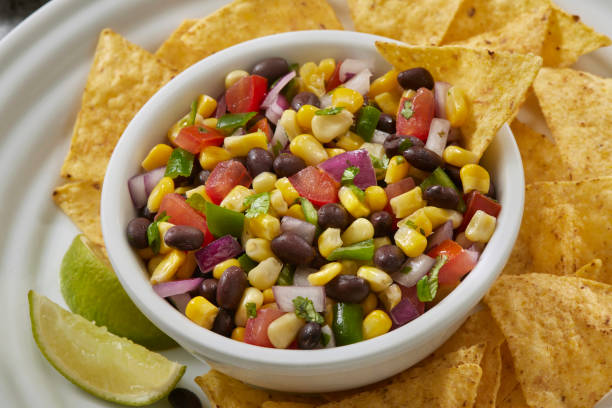 black bean and corn salsa - corn and bean salsa on burrito stock pictures, royalty-free photos & images